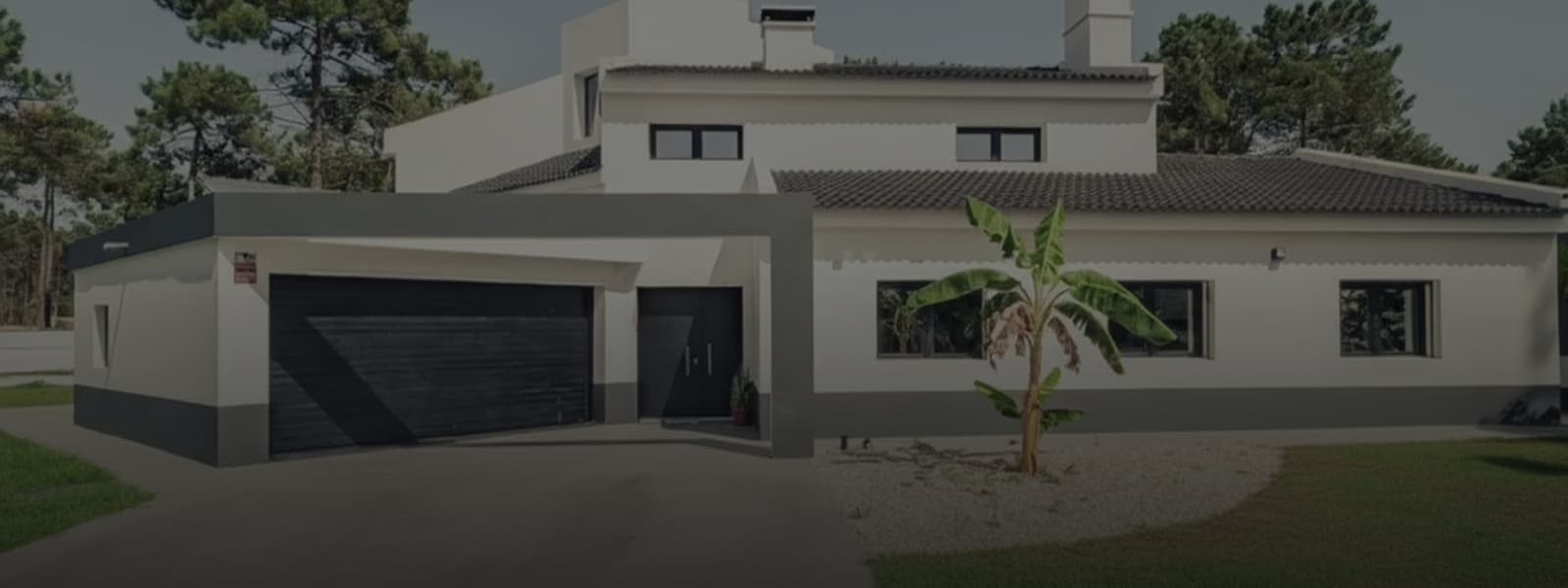 Street entrance with the garage and front door